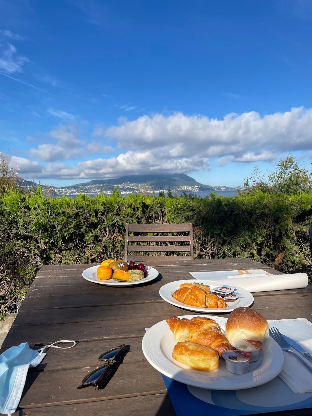Breakfast with a view overlooking Mount Vesuvius and the Bay of Naples from the hotel's outdoor terrace.